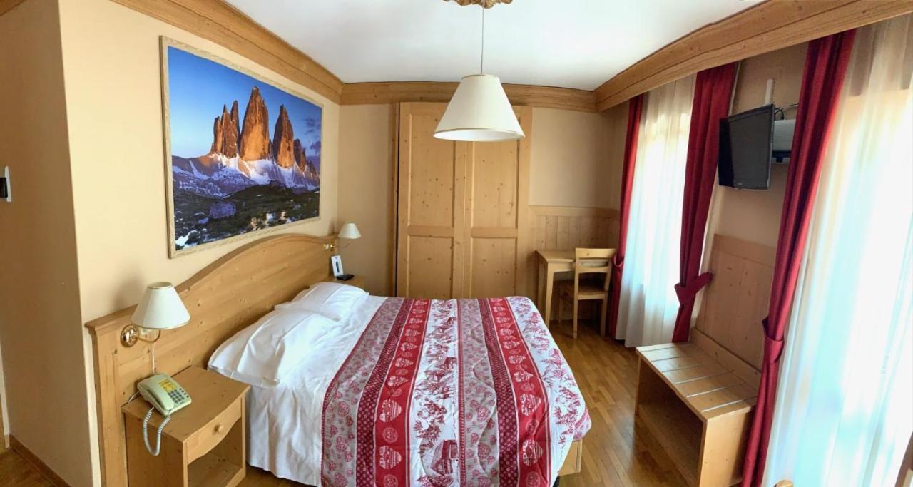 Albergo Garni Ajarnola เอารอนโซ ดิ คาโดเร ภายนอก รูปภาพ